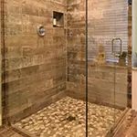 Frameless Glass Shower with Brushed Nickel Hardware