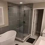 Frameless Glass Shower with Brushed Nickel Hardware