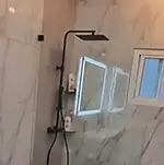 Frameless Glass Fixed Shower Panel with Matte Black Hardware