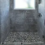Frameless Glass Shower with Chrome Hardware
