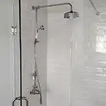 Frameless Glass Shower with Chrome Hardware