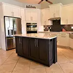Forevermark: Ice White Shaker Cabinets with Greystone Shaker Island